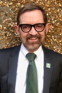 Robert Parker, smiling at the camera