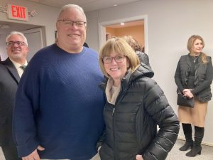 Debbie Burklow, daughter of NewBridge founder Herbert Irwin, with her husband Miles Burklow inside the new NewBridge headquarters.